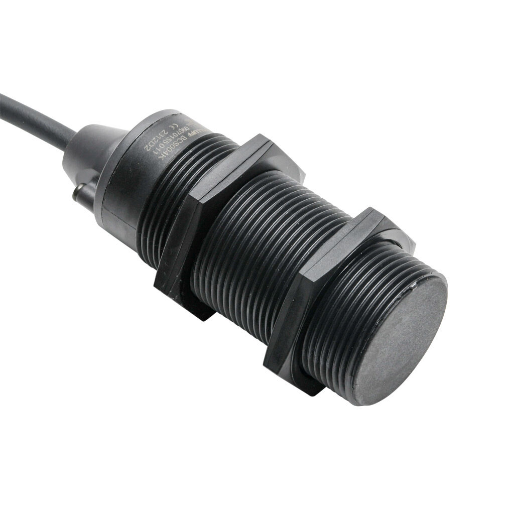 BCS004K - Balluff capacitive proximity sensor, tubular, 30mm diameter x 82mm body, polybutylene terephthalate housing, PNP, N.O./N.C. selectable, 20mm sensing distance, flush, 100 Hz switching frequency, IP66, pigtail.