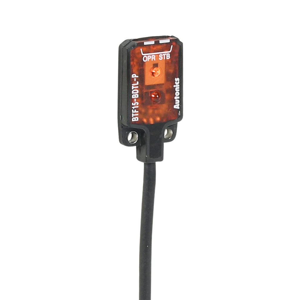 BTF15-BDTL-P - Autonics photoelectric sensor, rectangular, background suppression, visible red, 1-15mm sensing distance, light-on, PNP, 20.8 x 13 x 3.7mm body, polybutylene terephthalate, 6.5ft/2m cable length, pigtail.