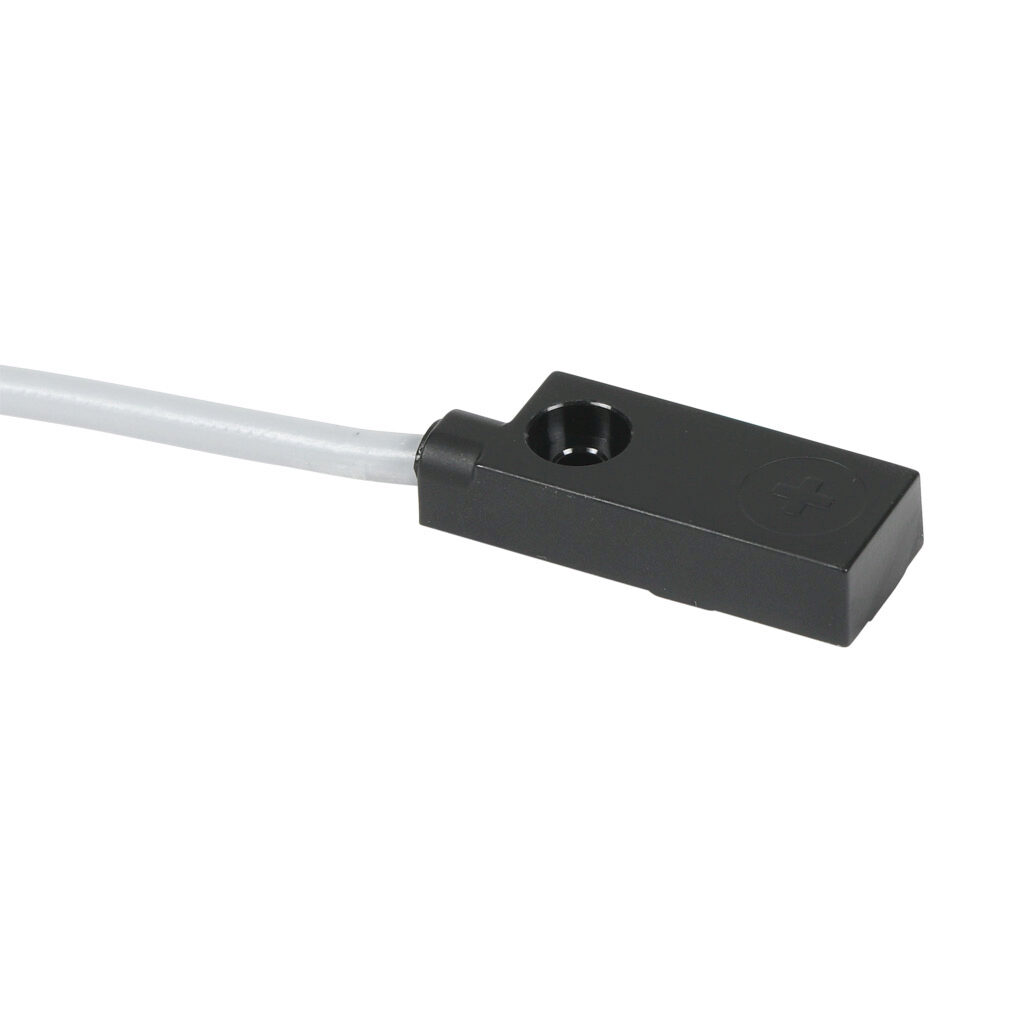 DW-AD-611-C12P - Contrinex inductive proximity sensor, rectangular, 12 x 27 x 6.5mm body, polycarbonate housing, top sensing, NPN, N.O. output, 4mm sensing distance, non-flush, 2000 Hz switching frequency, IP67, pigtail.
